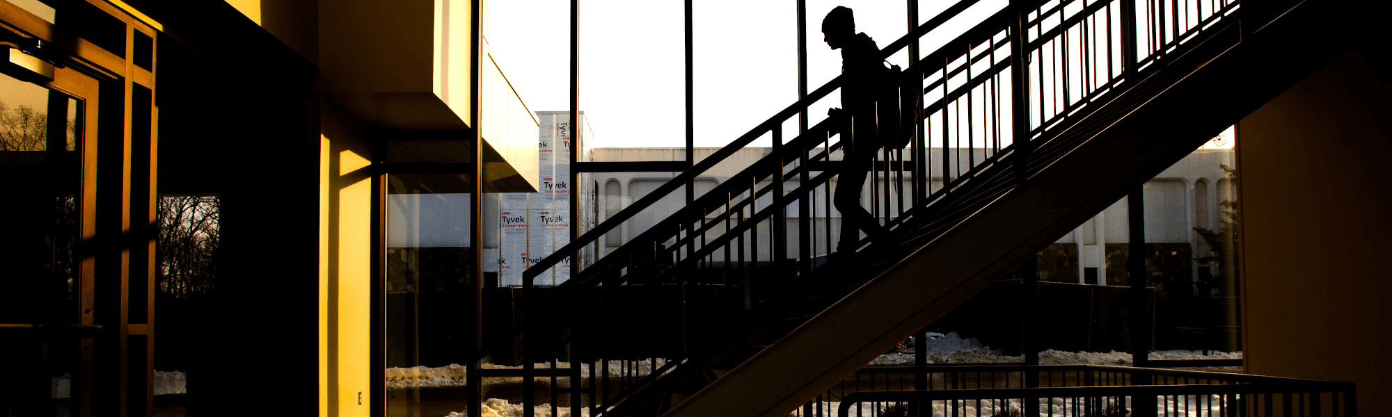 Photo of GVSU student in Ausable Hall.